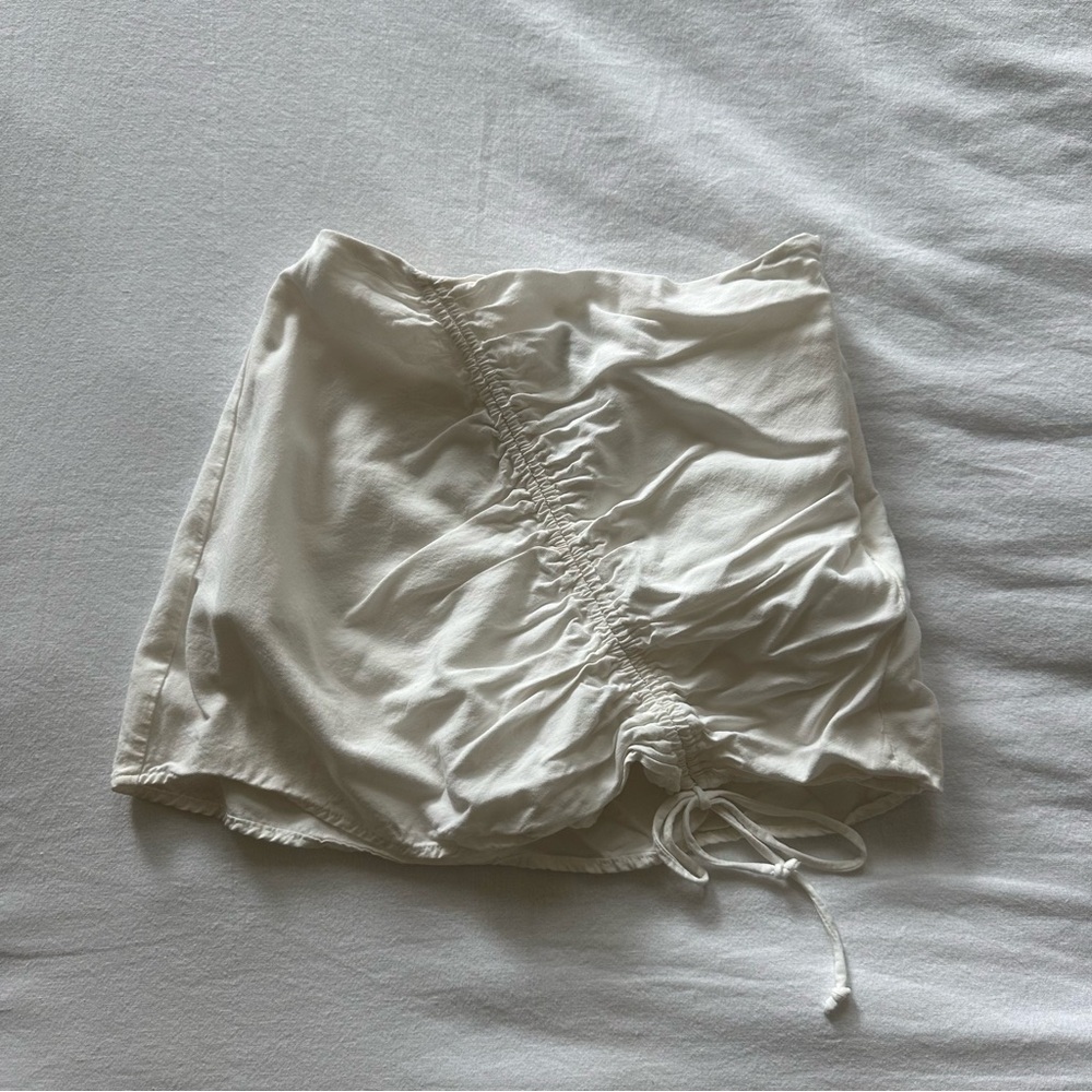 White mini skort with side tie